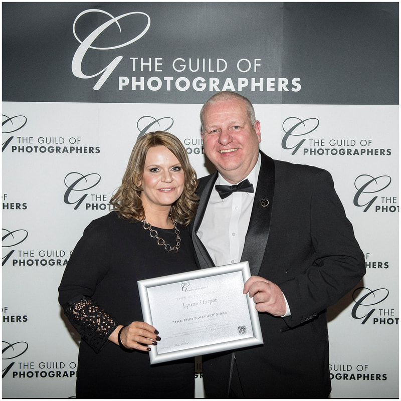 Lynne Harper receiving her Photographers bar certificate